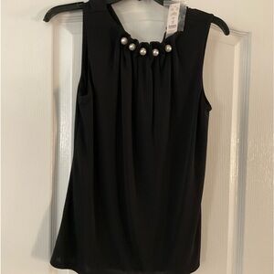 Black and white black sleeveless top with pearls